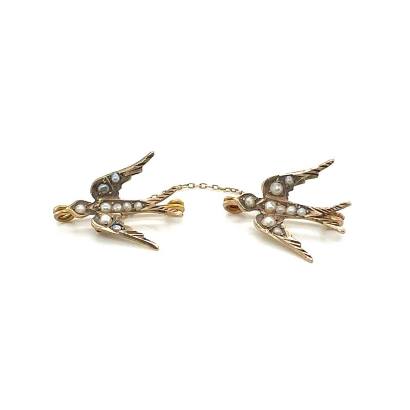 Pair Edwardian 9ct seed pearl swallow bird brooch