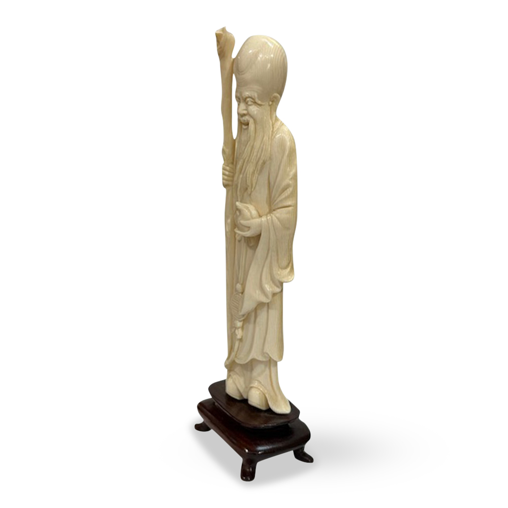 Antique ivory carving of shou-xing on wooden base c. 1910