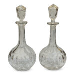 Pair cut crystal lidded decanters