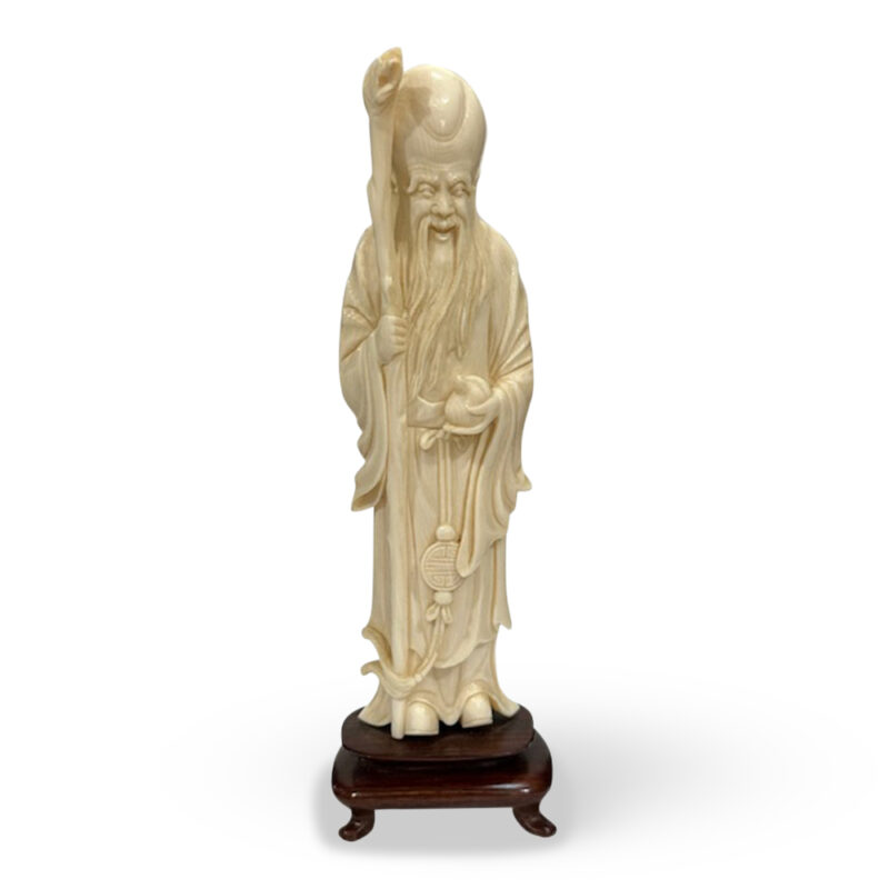 Antique ivory carving of shou-xing on wooden base c. 1910