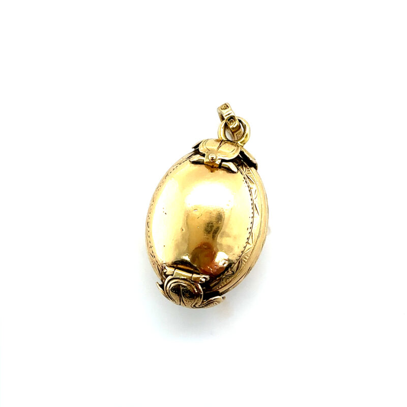 rare 19th century 18ct gold egg shaped ovoid hinged multi-segmented pictore locket