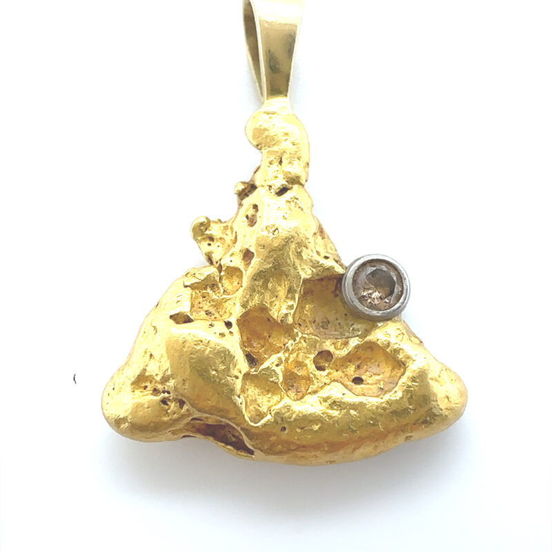 Gold nugget pendant with inset diamond