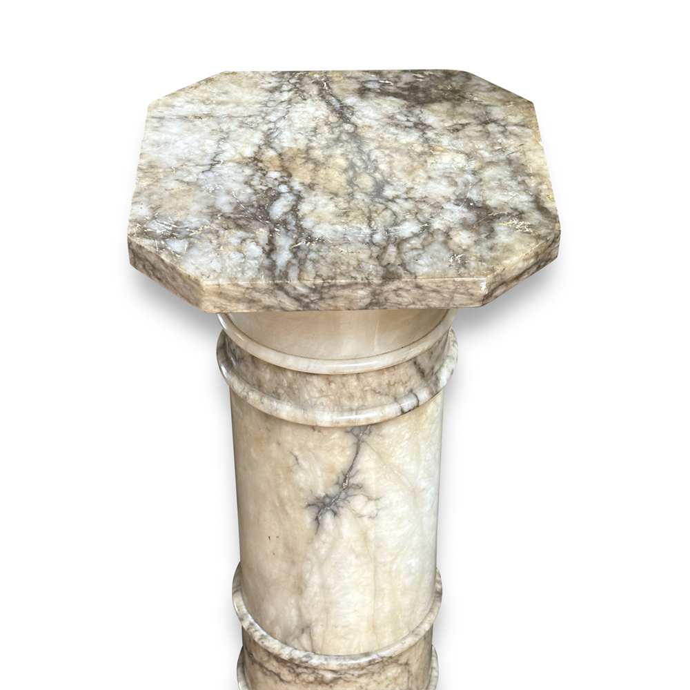 white alabaster pedestal