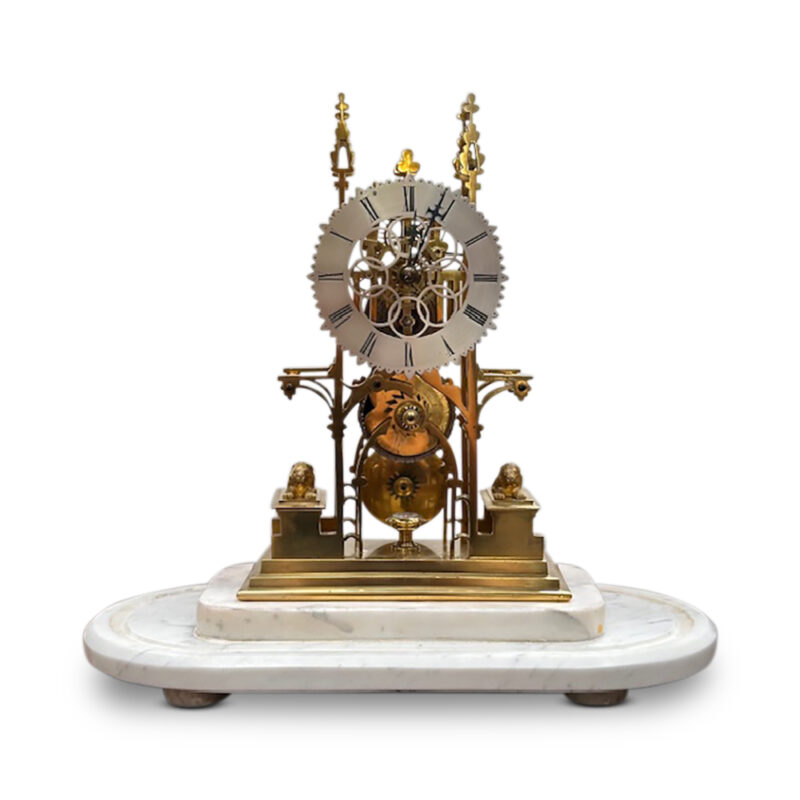 19th century brass skeleton clock in glass dome on marble base